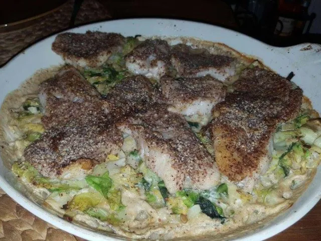 Rotbarschfilet mit Mandelkruste auf Spitzkohl