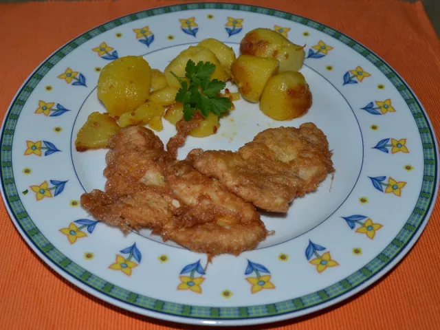 Putenschnitzerl im Senfmantel