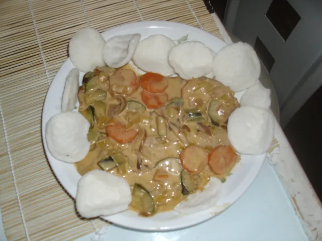 Red Curry mit Schweinsrücken und Hummerchips